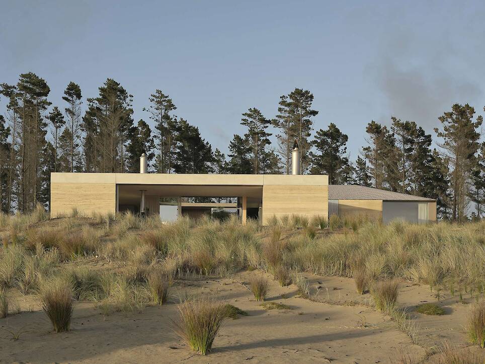 Floor-to-Ceiling Glass Sliders Peel Back Entire Walls at This Rammed Earth Home in New Zealand - Photo 3 of 18 -
