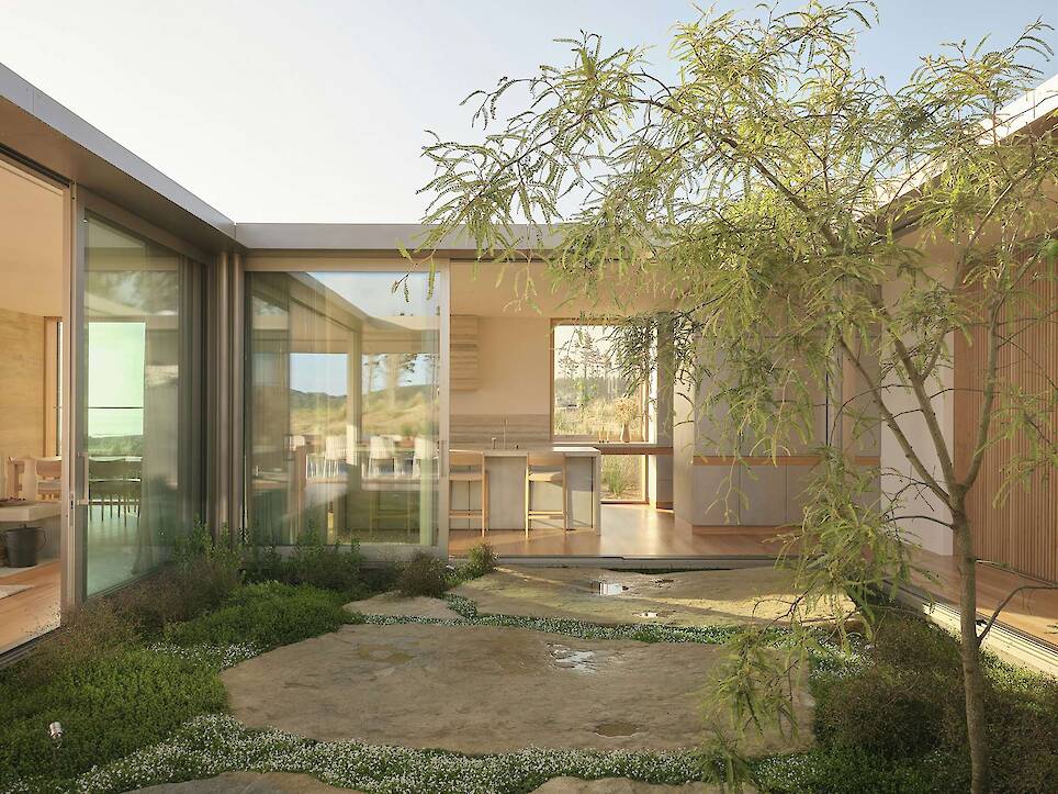 Floor-to-Ceiling Glass Sliders Peel Back Entire Walls at This Rammed Earth Home in New Zealand - Photo 15 of 18 -