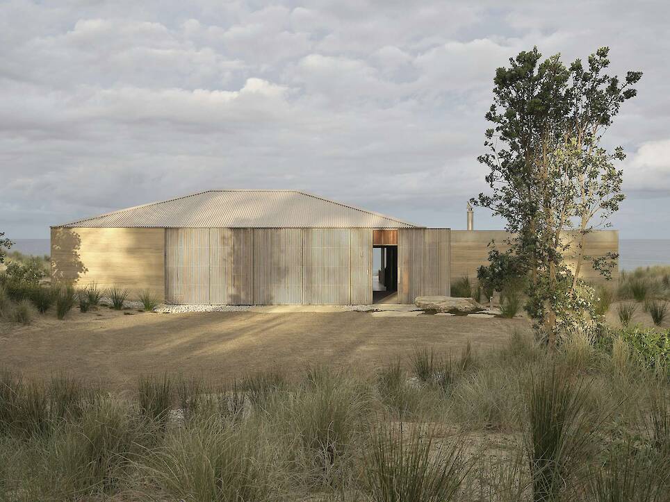 Floor-to-Ceiling Glass Sliders Peel Back Entire Walls at This Rammed Earth Home in New Zealand - Photo 4 of 18 -