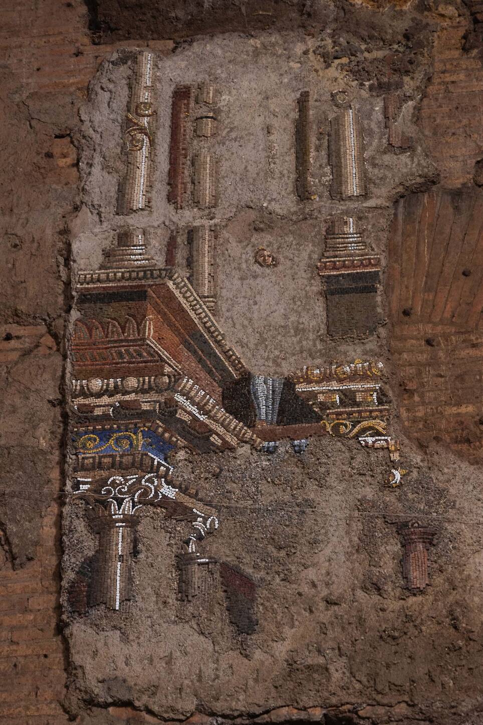 fragments of a conserved ancient Roman mosaic, in situ underground where it was discovered in Rome