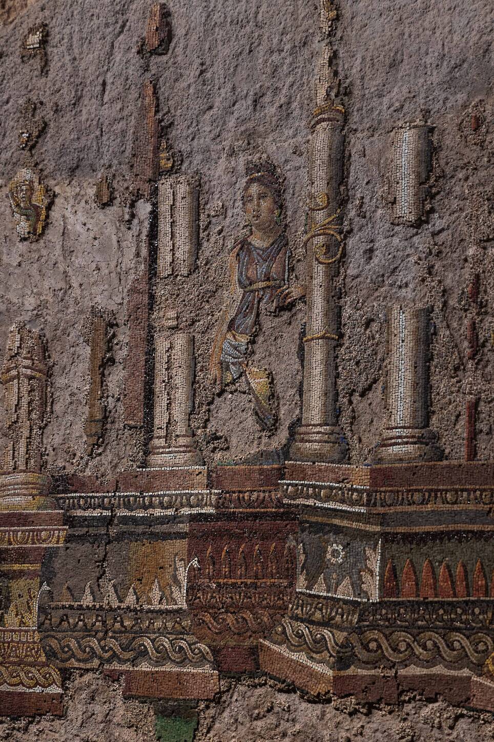 fragments of a conserved ancient Roman mosaic, in situ underground where it was discovered in Rome