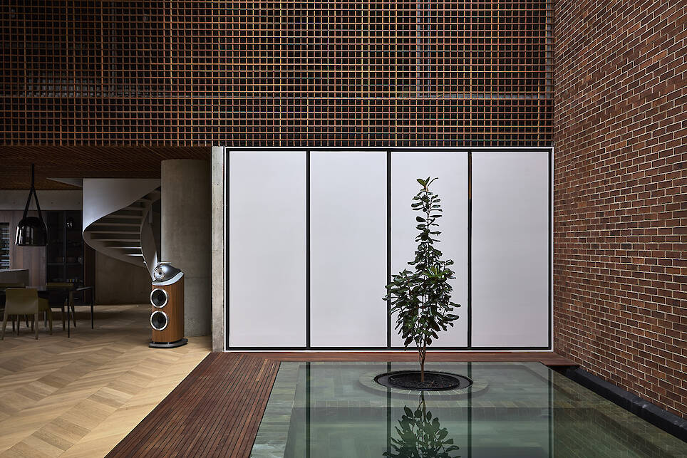 interior of Medellín apartment, tall ceilings, contemporary design, timber lattices