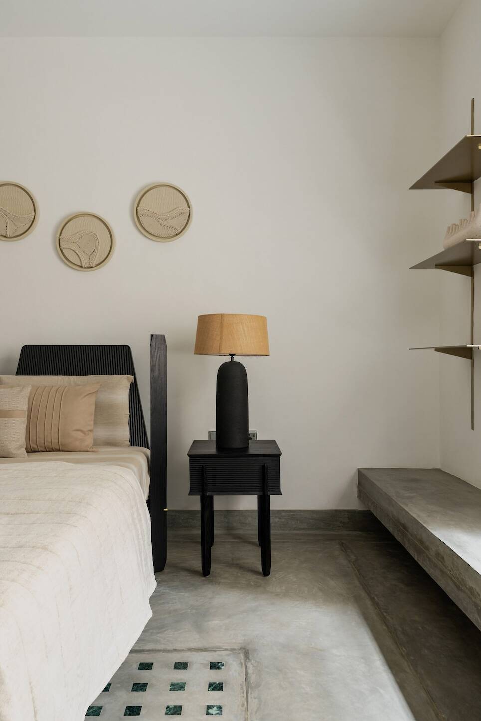 A lighter material palette is used in the interior
