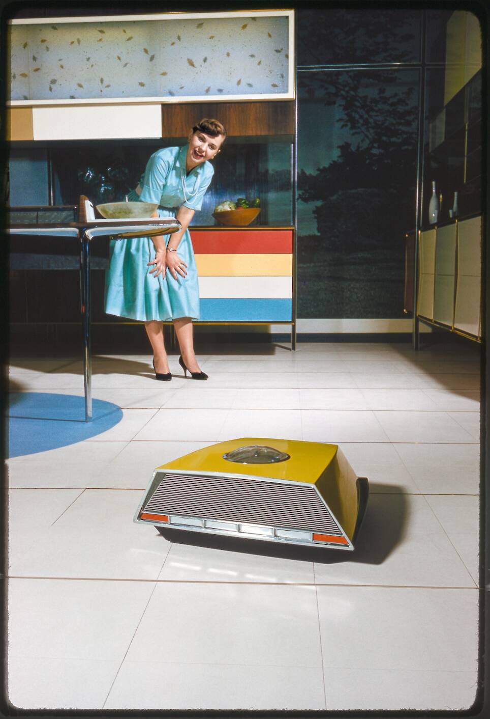 <p>Bob Lerner, Anne Anderson in RCA Whirlpool Miracle Kitchen, 1959, kitchen designed 1956, photo 1959, printed 2026</p>