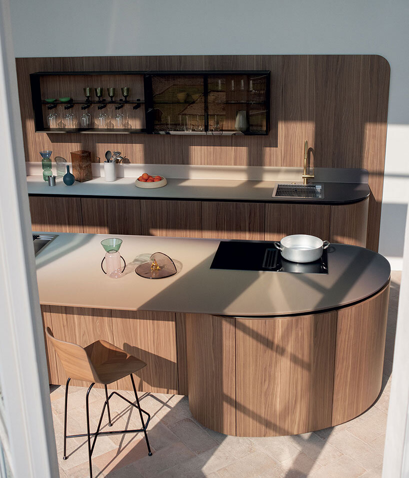 Tangram island in verde comodoro anodyc lacquer with groove doors cesar tangram kitchen island featuring an integrated snack bar counter tangram base units featuring a nuance gl